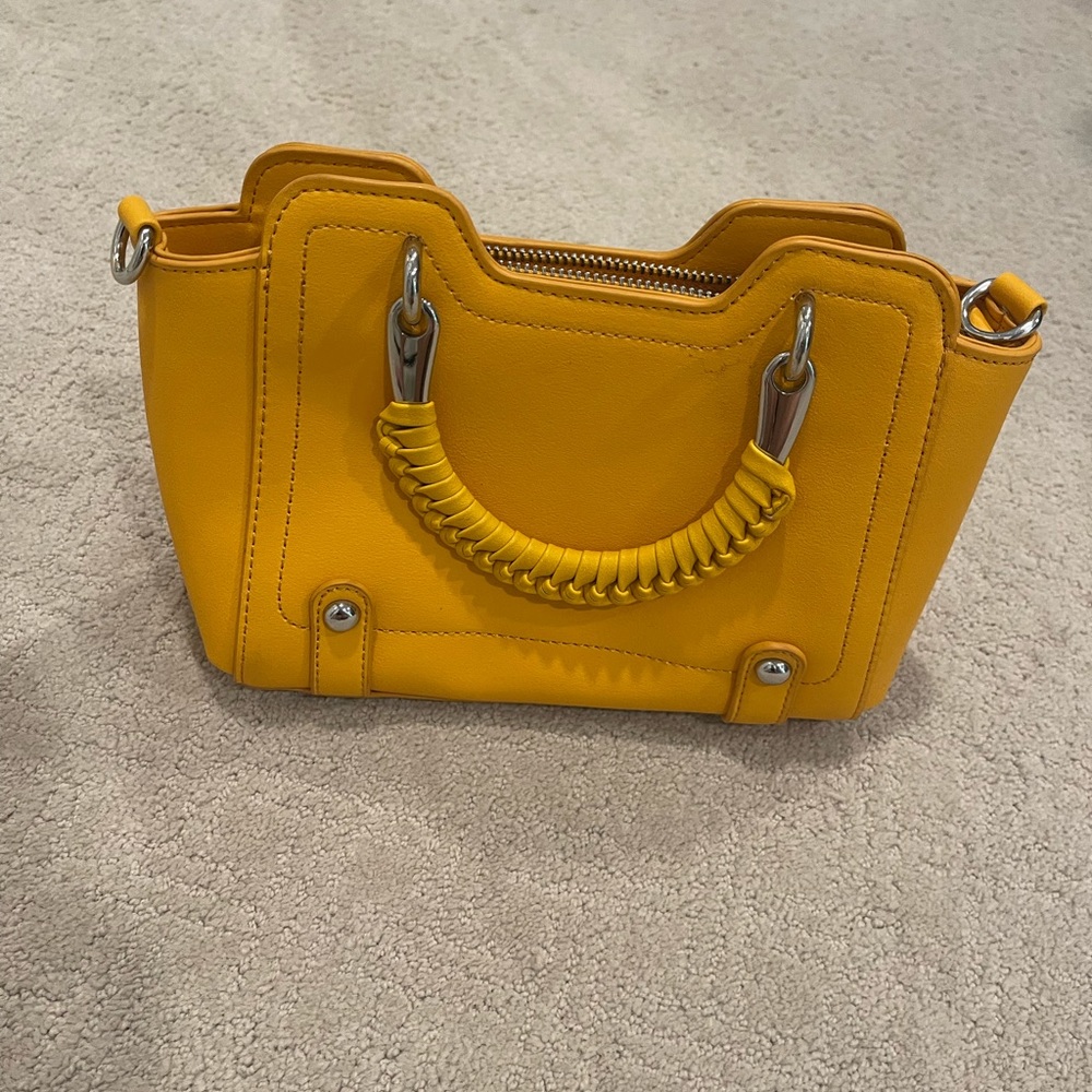 Yellow little purse with strap